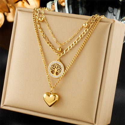 Layering Halskette Herz Lebensbaum Damen Gold Titanstahl Kristalle Karma