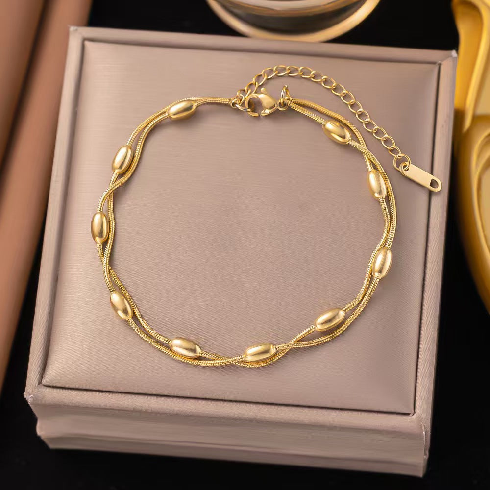 Schmuckset Armband und Fußkette Gold Edelstahl vergoldet modern Damenarmband Damenfußkette wasserfest hypoallergen rostfrei Karma