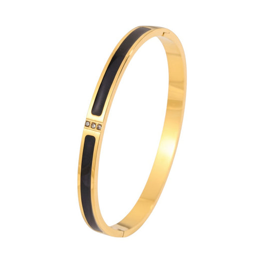Armreif Gold Schwarz Edelstahl vergoldet Damenarmreif wasserfest hypoallergen Karma
