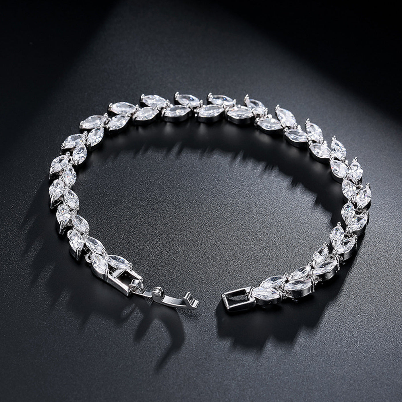 Tennisarmband mit Zirkonia vergoldet vers. Farben Karma