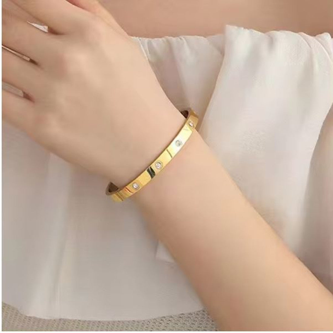 Damenarmreif Gold Karma