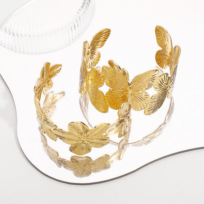Damenarmreif Gold Schmetterling oder Blumen KARMA
