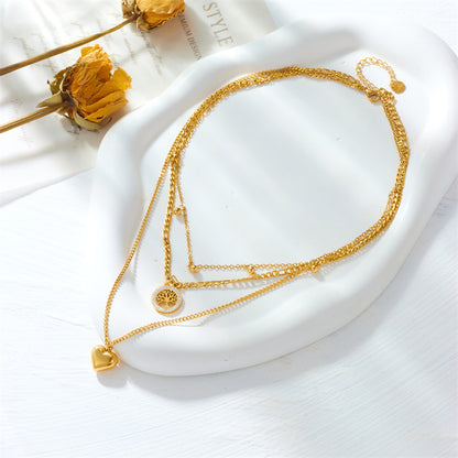 Layering Halskette Herz Lebensbaum Damen Gold Titanstahl Kristalle Karma