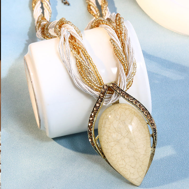 Statementkette Tropfen Anhänger Creme Beige 47 cm Halskette Damen Kette modern Karma