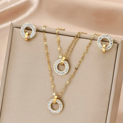 Schmuckset Damen Gold Edelstahl Kristalle Halskette Ohrstecker und Armband Karma