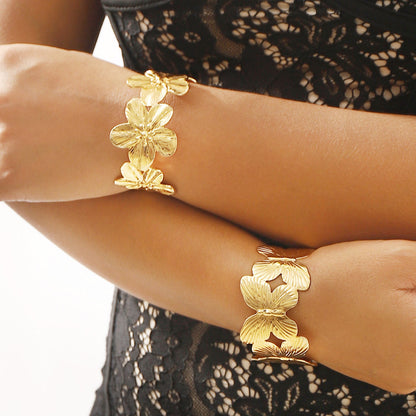 Damenarmreif Gold Schmetterling oder Blumen KARMA